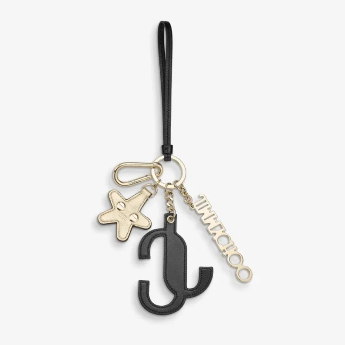 Colgante para bolso Jc Multi Charm en piel de becerro negra y naranja con logotipo de estrella