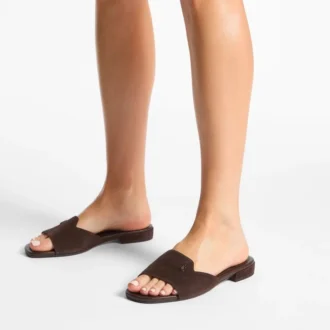 Dina Flat: sandalias cruzadas con talón abierto de piel napa negra