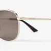 Gafas de sol metálicas Pantos Dune en oro pálido y marrón oscuro Gafas de sol metálicas Pantos Dune en oro pálido y marrón oscuro