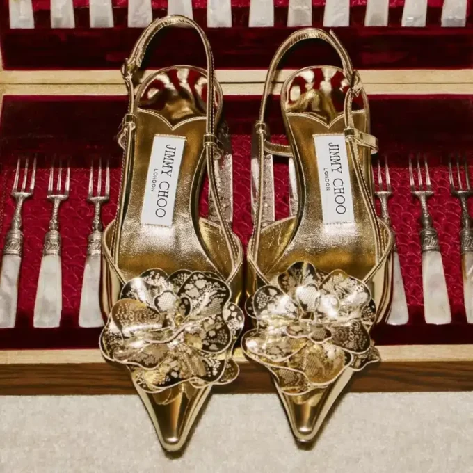 Mimmi Sling Back 50 Zapatos de tacón con correa trasera de piel Liquid Metal dorada y adorno perforado de jimmy choo Mimmi Sling Back 50 Zapatos de tacón con correa trasera de piel Liquid Metal dorada y adorno perforado de jimmy choo