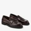Mocasines Ivy de piel con relieve de cocodrilo brillante en color Sambuco
