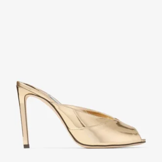 Mules Brigitte 100 de piel metalizada líquida dorada