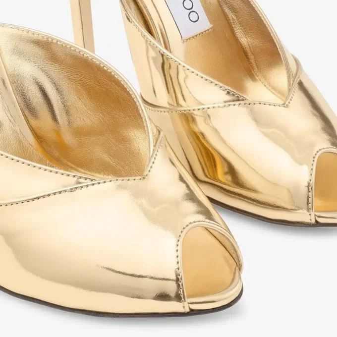 Mules Brigitte 100 de piel metalizada líquida dorada Mules Brigitte 100 de piel metalizada líquida dorada