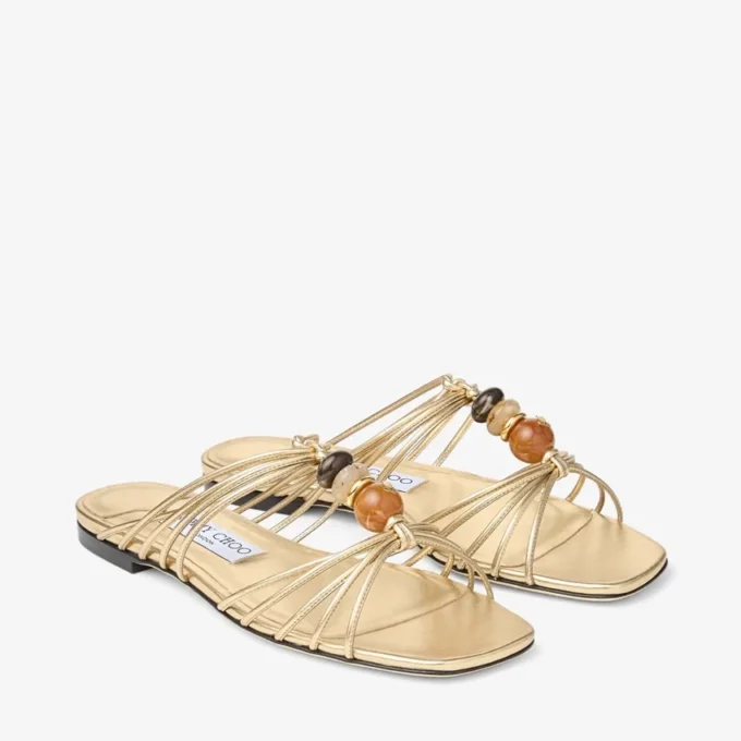 Mules Lova de piel napa metalizada dorada con abalorios Mules Lova de piel napa metalizada dorada con abalorios
