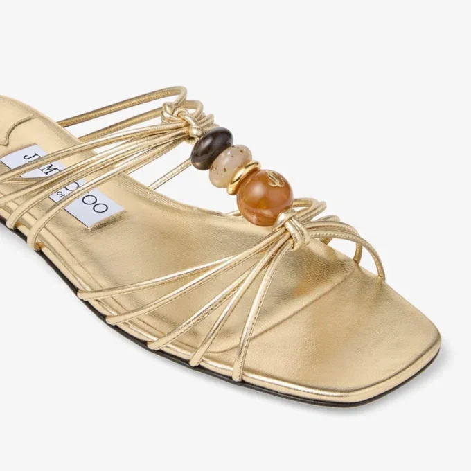 Mules Lova de piel napa metalizada dorada con abalorios Mules Lova de piel napa metalizada dorada con abalorios