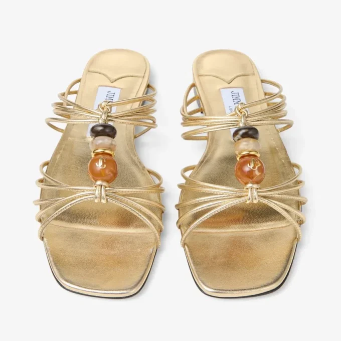 Mules Lova de piel napa metalizada dorada con abalorios Mules Lova de piel napa metalizada dorada con abalorios