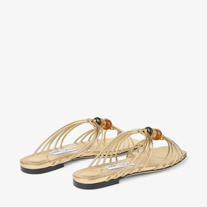 Mules Lova de piel napa metalizada dorada con abalorios Mules Lova de piel napa metalizada dorada con abalorios