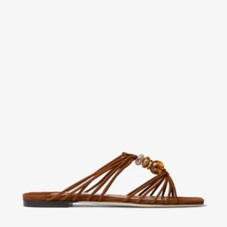 Mules Lova Mules de ante en tonos marrones con abalorios