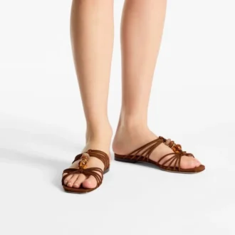 Mules Lova Mules de ante en tonos marrones con abalorios