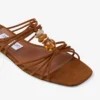 Mules Lova Mules de ante en tonos marrones con abalorios