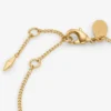 Pulsera fina con diamantes Pulsera de cadena fina con acabado dorado