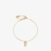 Pulsera Jc Pearl Cube Pulsera de metal dorado con perla y cubo de cristal