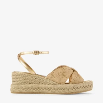 Sandalias de cuña Aella 60 de rafia dorada