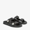 Sandalias Fayence Sandalias planas de cuero negro con adornos de perlas
