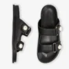 Sandalias Fayence Sandalias planas de cuero negro con adornos de perlas