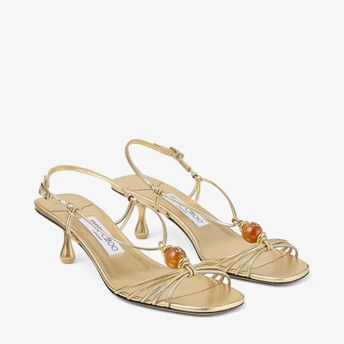Sandalias Lova 50 de piel napa metalizada dorada con abalorios