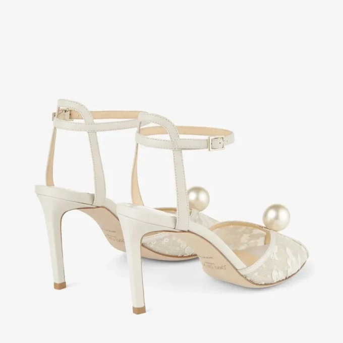 Sandalias Sacora 85 de encaje floral marfil con detalle de perla Sandalias Sacora 85 de encaje floral marfil con detalle de perla