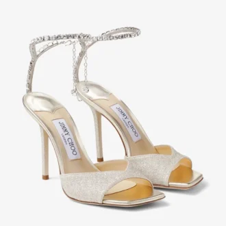 Sandalias Saeda 100 Platinum Ice con purpurina mate y adornos de cristal