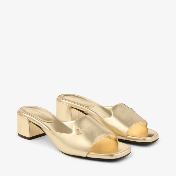 Sandalias tipo mule Dina 45 de piel metalizada dorada Sandalias tipo mule Dina 45 de piel metalizada dorada