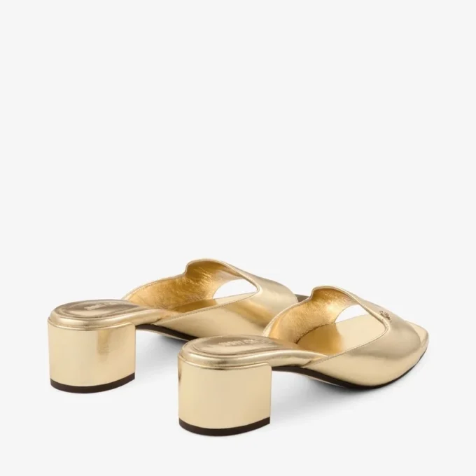 Sandalias tipo mule Dina 45 de piel metalizada dorada Sandalias tipo mule Dina 45 de piel metalizada dorada