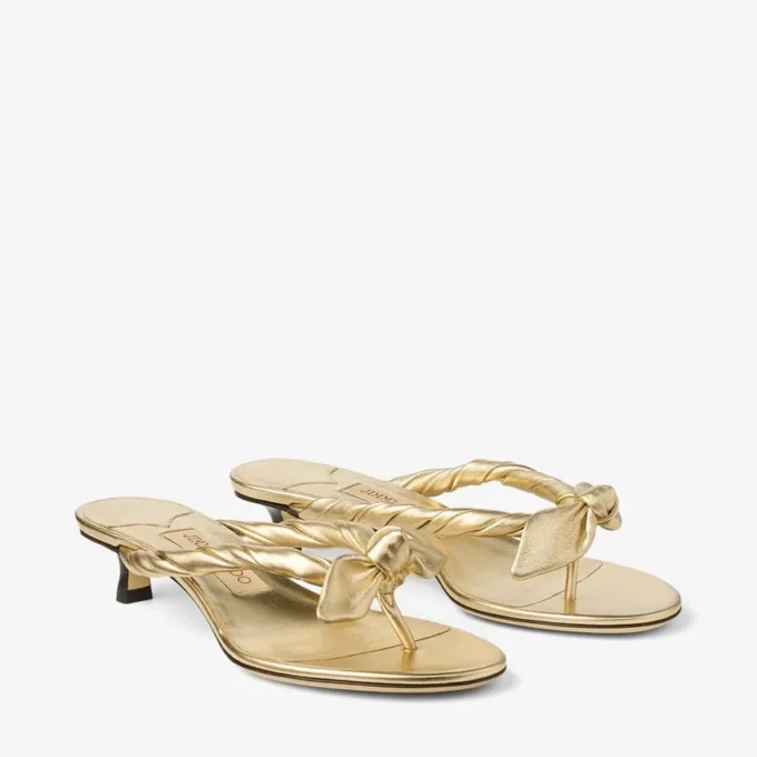 Sandalias tipo mule Liss 35 de piel napa metalizada dorada con lazo Sandalias tipo mule Liss 35 de piel napa metalizada dorada con lazo