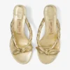 Sandalias tipo mule Liss 35 de piel napa metalizada dorada con lazo Sandalias tipo mule Liss 35 de piel napa metalizada dorada con lazo