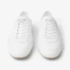 Zapatillas bajas «Sunny F» en combinación de piel blanca y color goma Zapatillas bajas «Sunny F» en combinación de piel blanca y color goma