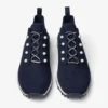 Zapatillas Veles de punto jaspeado de cachemira en color marino con botones de perla